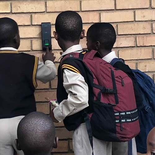 Pupils of the Ntji Mothapo Primary School in Polokwane, Limpopo, scan their fingerprints when they clock in at school.